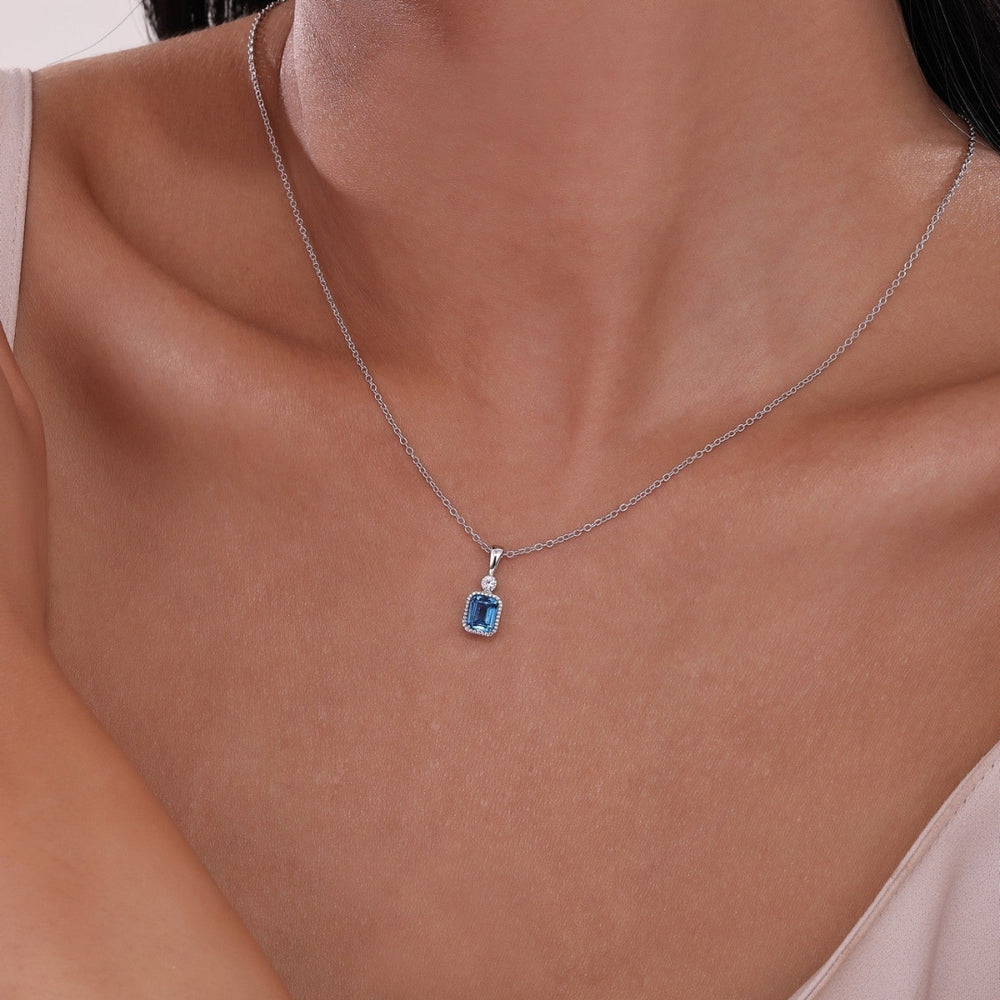 SS/PT 0.91cttw Simulated Diamond & Simulated Blue Topaz Pendant Necklace