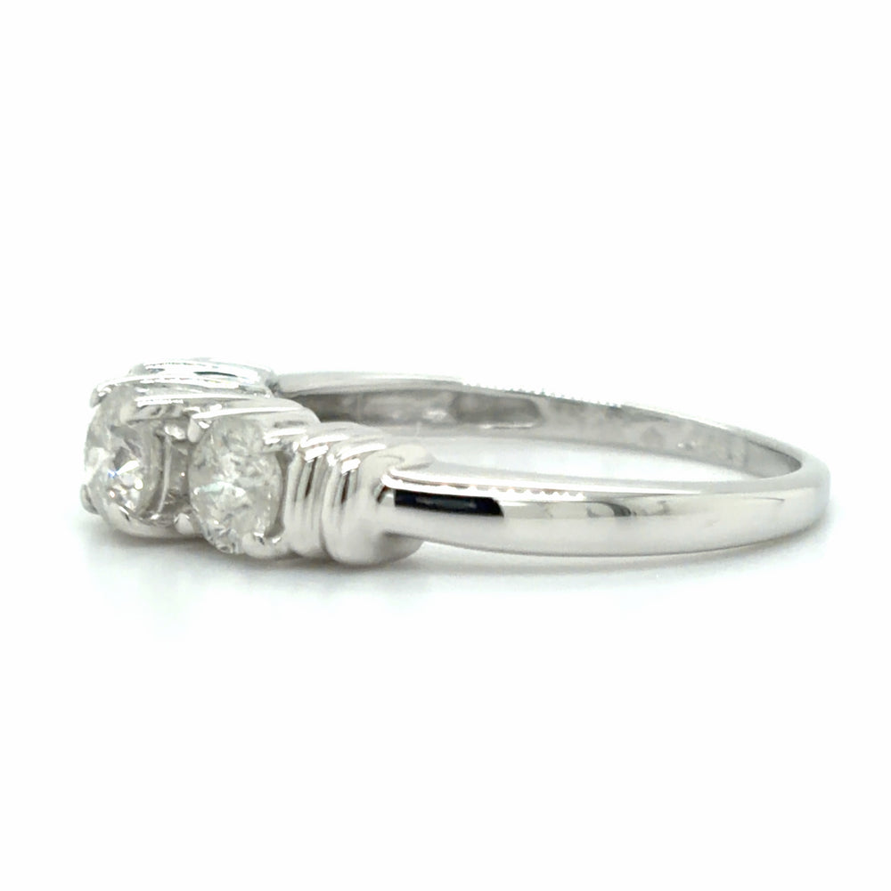 Estate size 7 3-Stone Anniversary Band