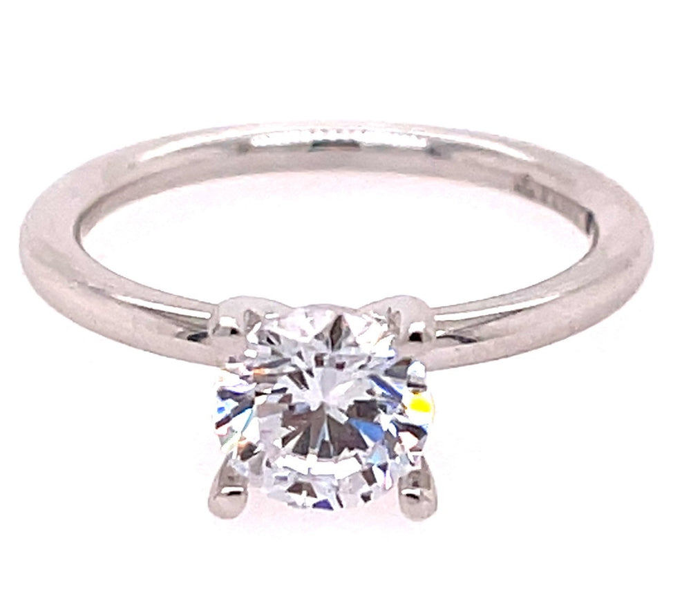 Simplistic Semi-Mount Engagement Ring by Fana