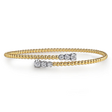 14K White and Yellow Gold Bujukan Graduating Diamond Bypass Bangle