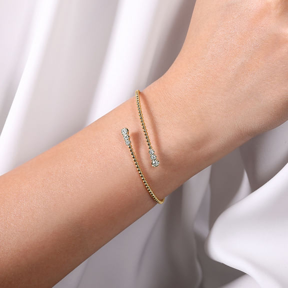 14K White and Yellow Gold Bujukan Graduating Diamond Bypass Bangle