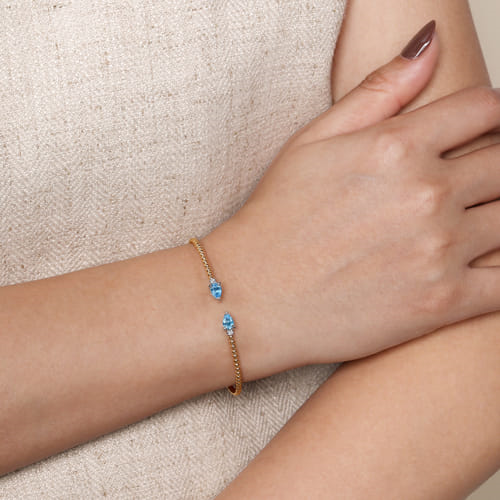 14K White & Yellow Gold Bujukan Open Cuff Bracelet with 0.94cttw Blue Topaz and 0.09cttw Diamond End Caps