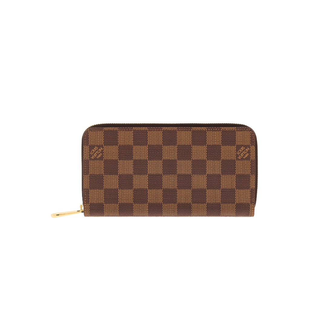 PREOWNED Louis Vuitton Damier Ebene Zippy Wallet