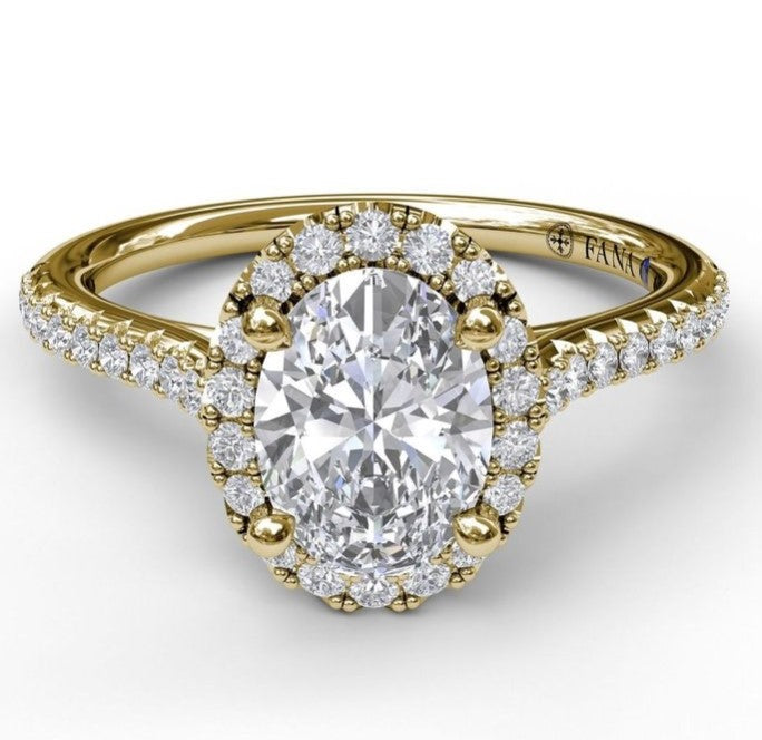 Delicate Oval Shaped Halo And Pave Band Engagement Ring